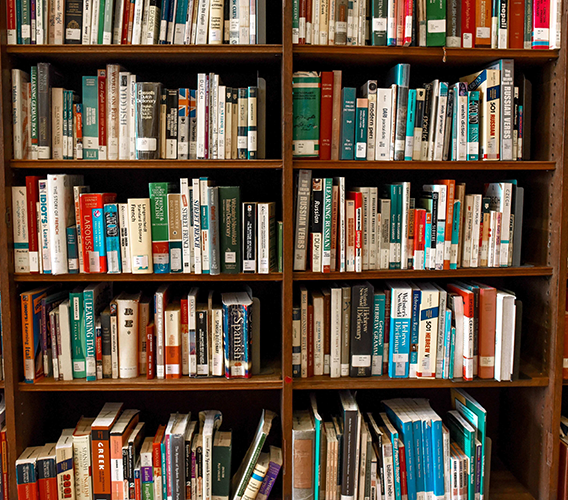 A stack of books indicating a lot of reading material is available to read here at The Voice of Elijah